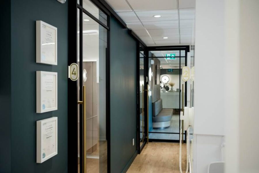 Dental clinic corridor and glass partition detail